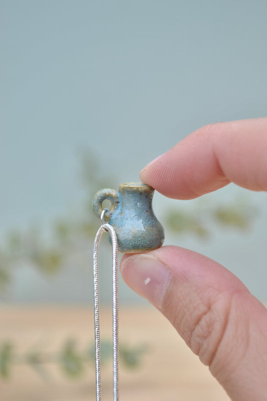 Tiny hand-thrown ceramic vase necklace