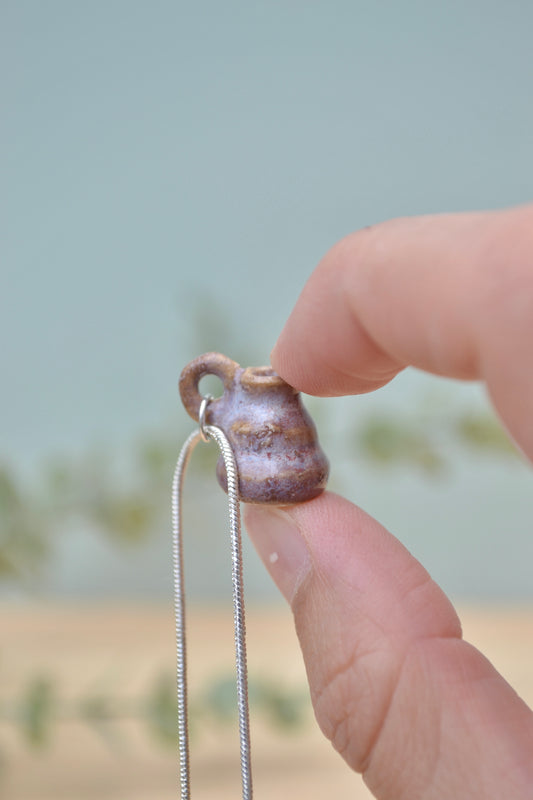 Tiny hand-thrown ceramic vase necklace