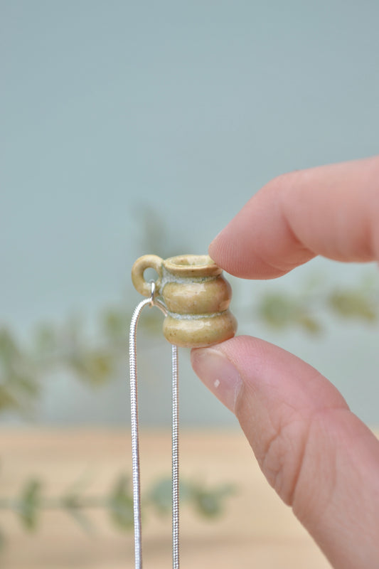 Tiny hand-thrown ceramic vase necklace