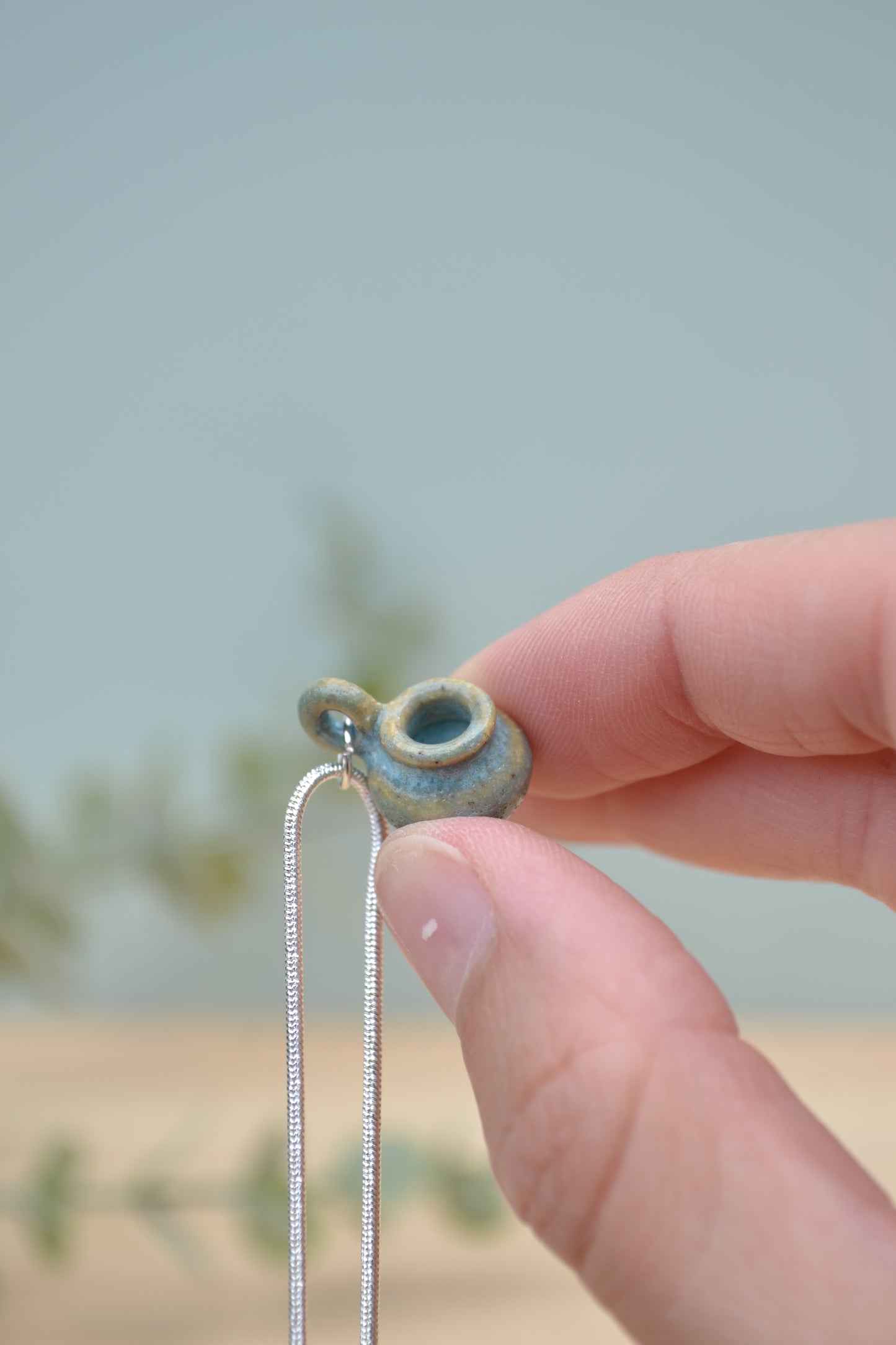 Tiny hand-thrown ceramic vase necklace
