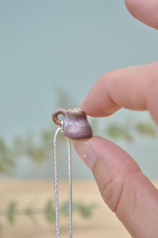 Tiny hand-thrown ceramic vase necklace