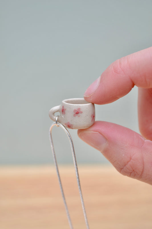Tiny hand-thrown ceramic mug- flowers